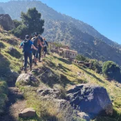 Local guide leading travelers on a mount toubkal hike